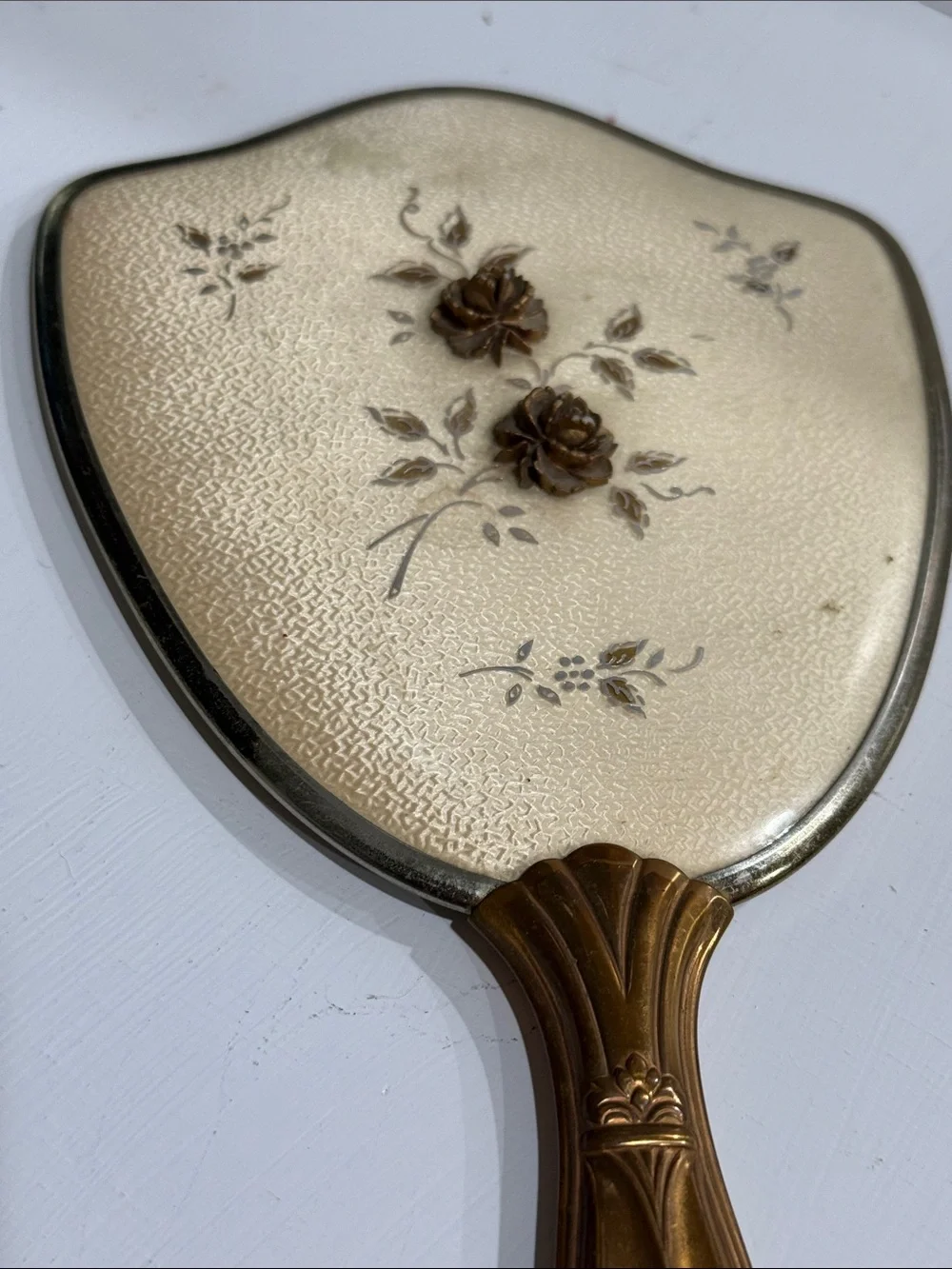 Mid Century Hollywood Regency Hand Held Mirror with Floral Detail 1950’s